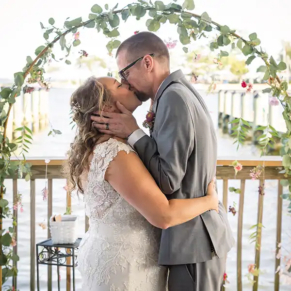 Couple kissing on their wedding day